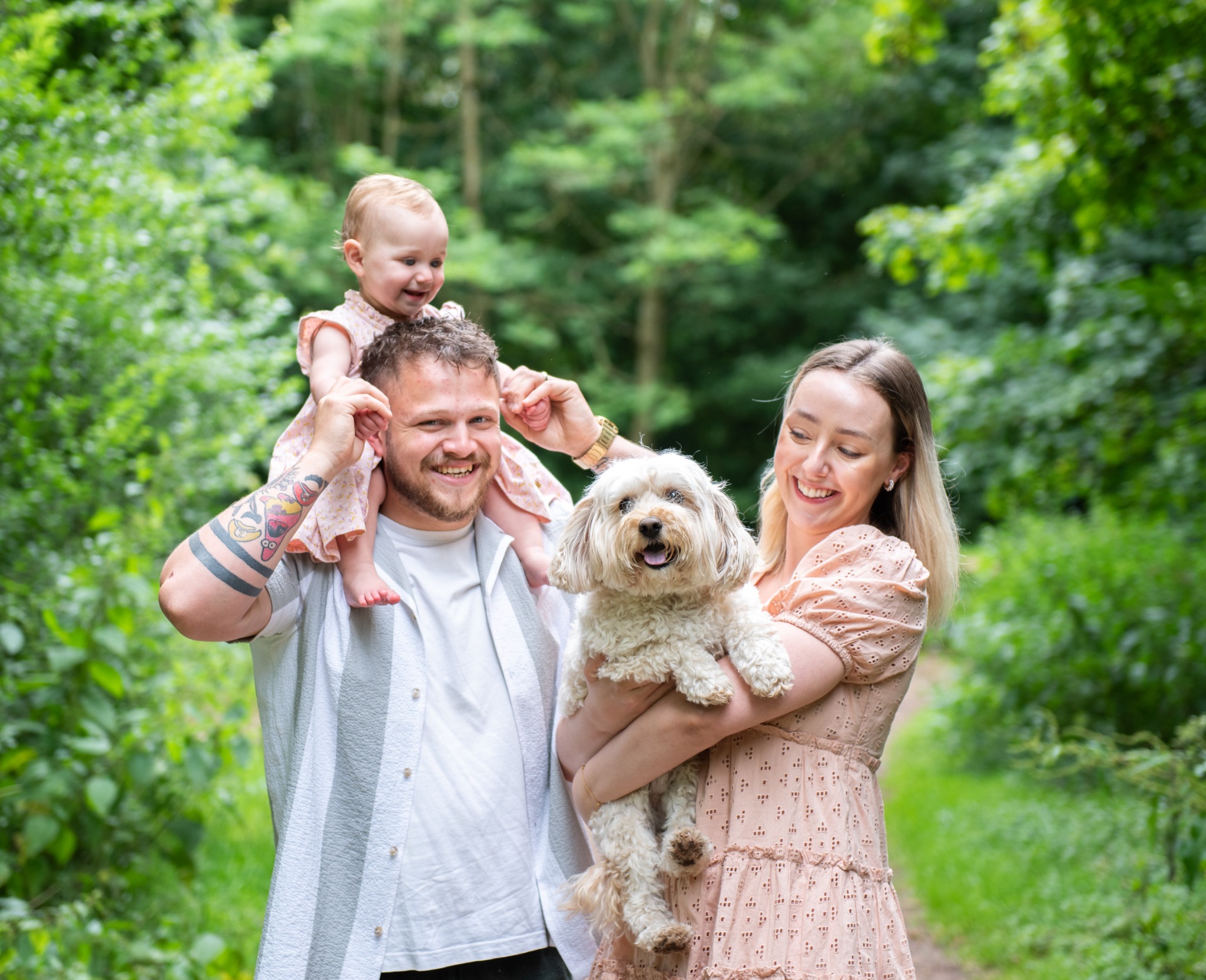 Emily Di Salvo with her family and dog during an outdoor photo session