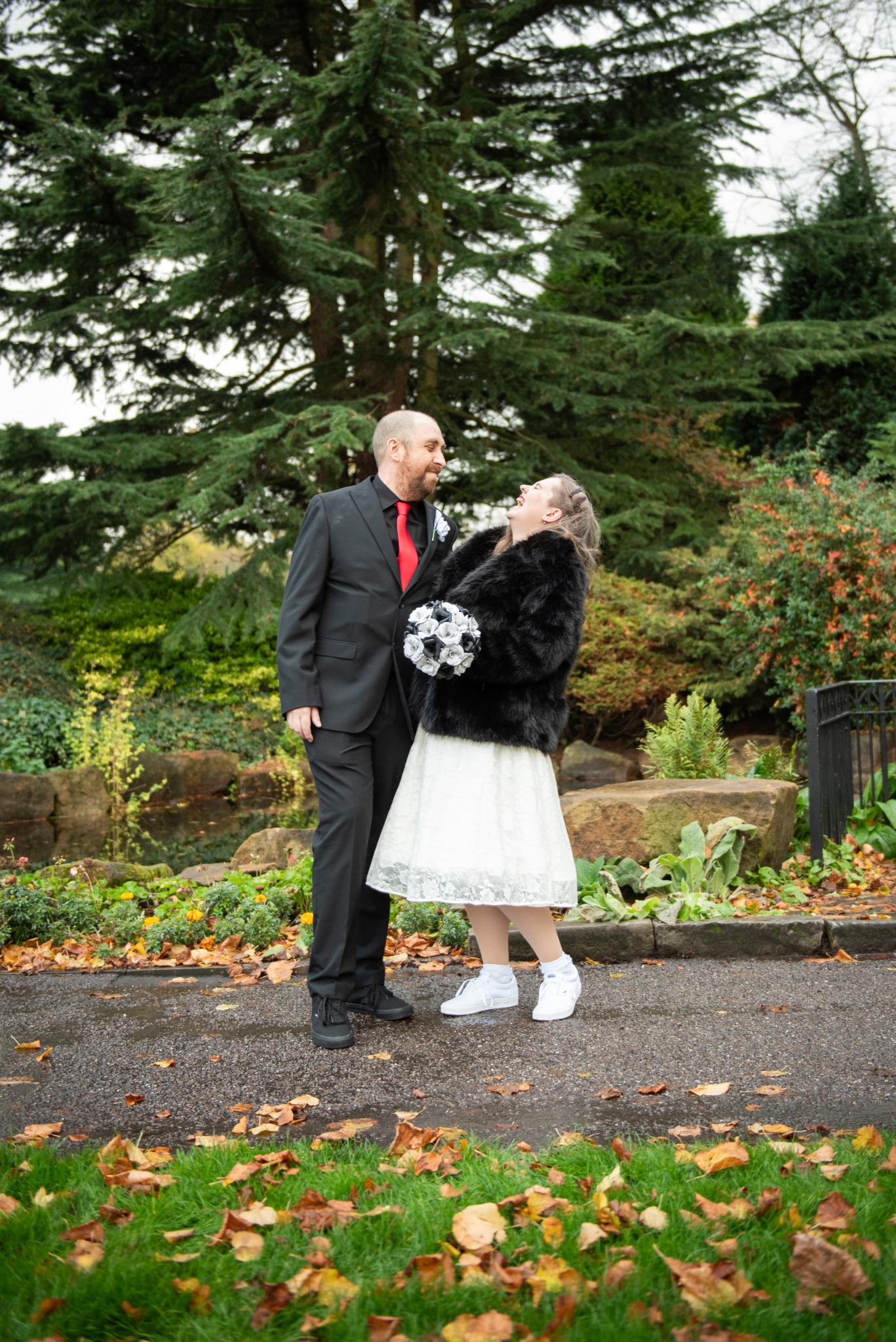 Mr and Mrs Jones laughing together on their wedding day